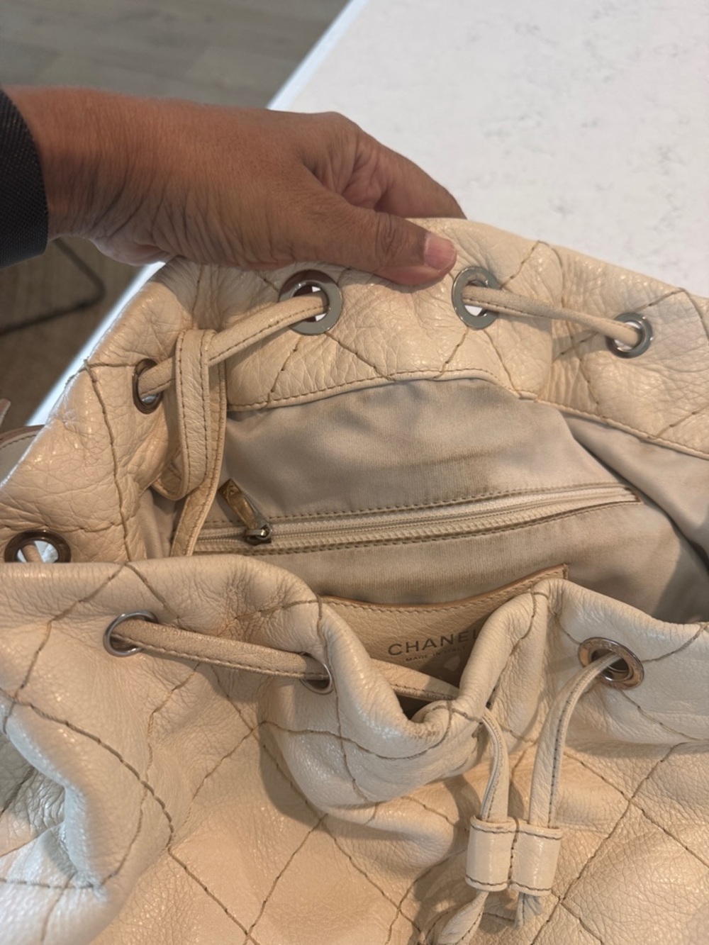 CHANEL Cream Quilted Drawstring Hobo with Charm - Picture 12 of 13